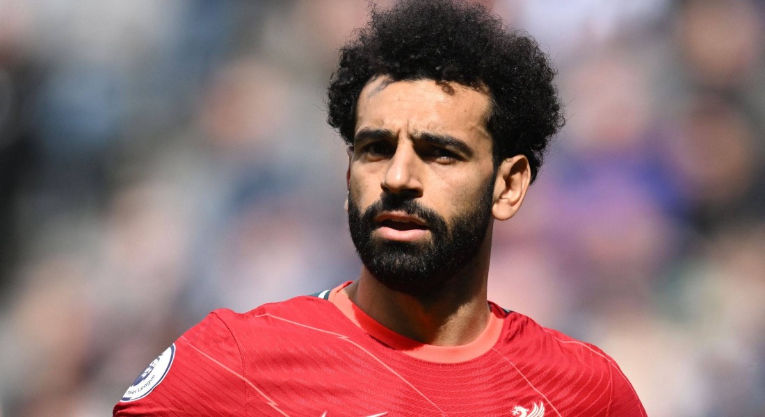 Liverpool's Egyptian midfielder Mohamed Salah reacts during the English Premier League football match between Newcastle United and Liverpool at St James' Park in Newcastle-upon-Tyne, north east England on April 30, 2022. (Photo by Paul ELLIS / AFP) / RESTRICTED TO EDITORIAL USE. No use with unauthorized audio, video, data, fixture lists, club/league logos or 'live' services. Online in-match use limited to 120 images. An additional 40 images may be used in extra time. No video emulation. Social media in-match use limited to 120 images. An additional 40 images may be used in extra time. No use in betting publications, games or single club/league/player publications. /